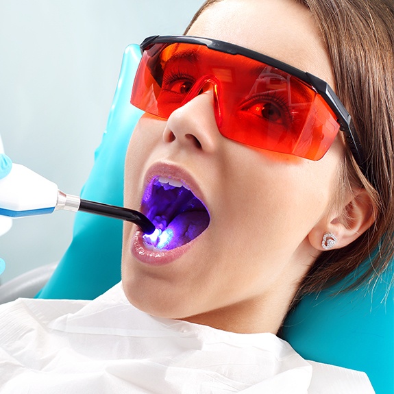 Young patient receiving dental sealants