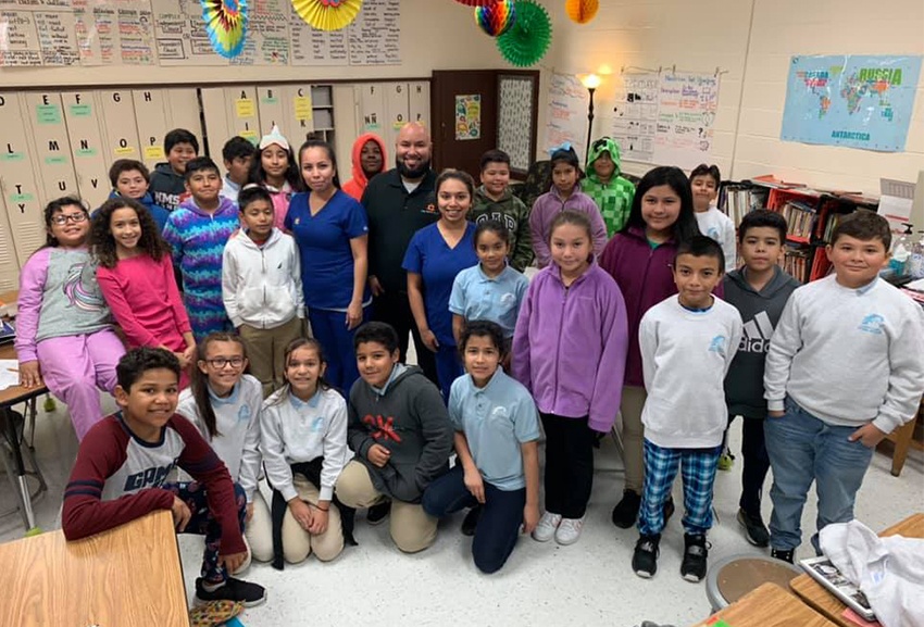 Dental team members in classroom