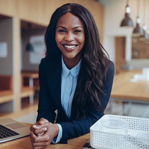 Businesswoman smiling after cosmetic dentistry in Fort Worth