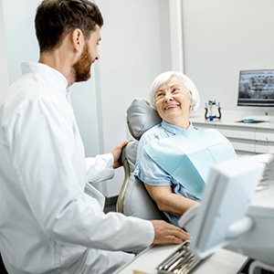 a patient talking to her dentist in Fort Worth