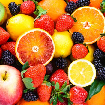A bunch of fruit and berries 
