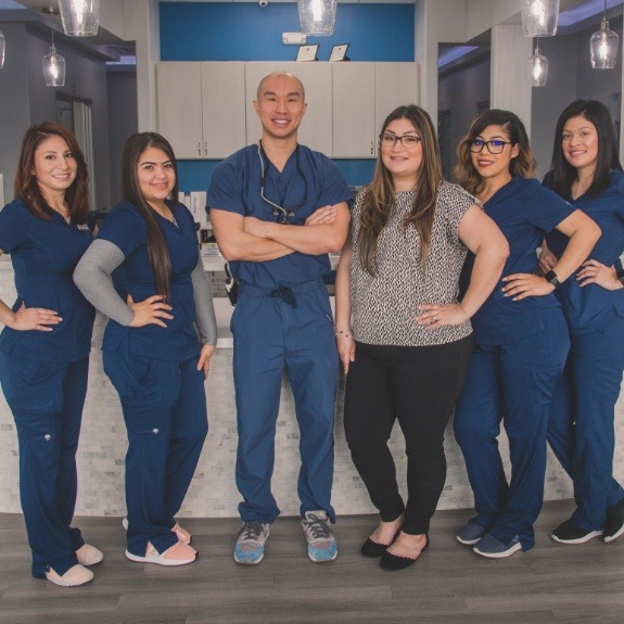 Dr. Duong and the dental team
