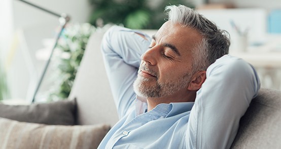 Man relaxing after sedation dentistry visit