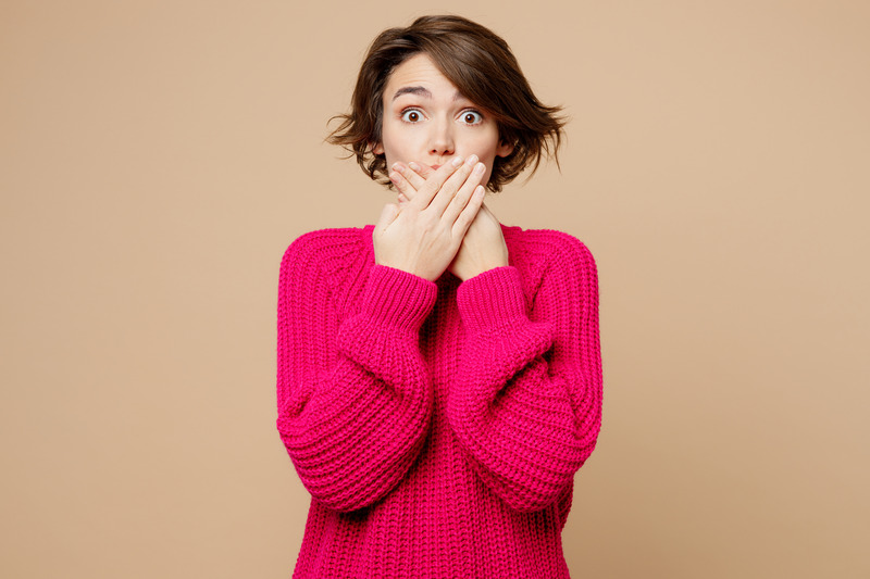 Patient wincing because of a dental emergency